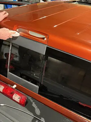 Fixing a water leak in a pickup by replacing the third brake light gasket.