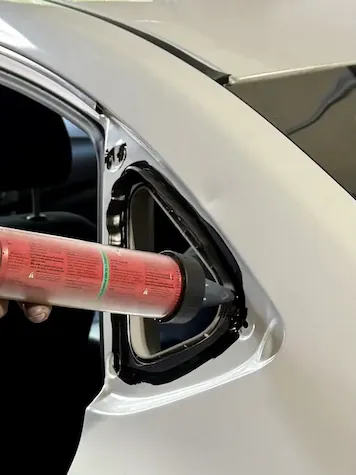 Urethane adhesive bead applied to quarter glass opening