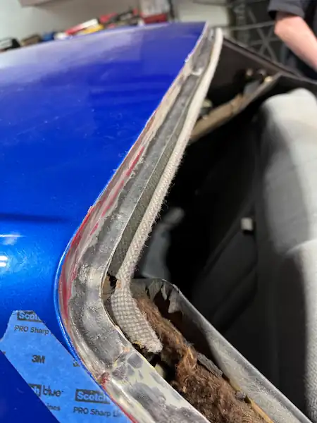 Nissan Skyline pinch weld rust ground to bare metal at 123 Glass Company in Omaha