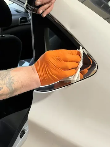 Quarter glass wiped clean after installation