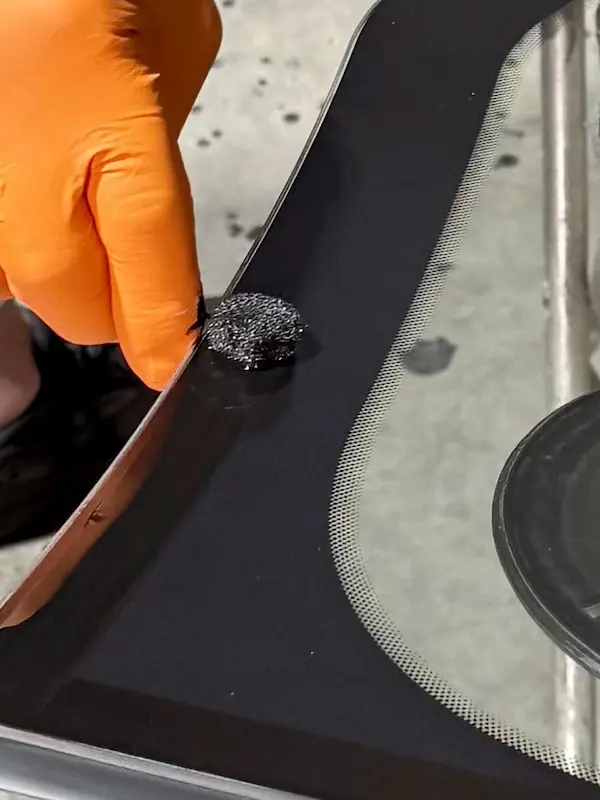 Applying BETAPRIME™ 5504G All-in-One Primer to windshield frit band at 123 Glass Company in Omaha