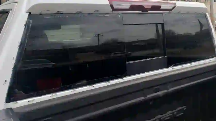 Completed rear glass replacement with protective tape still in place at 123 Glass Company in Omaha