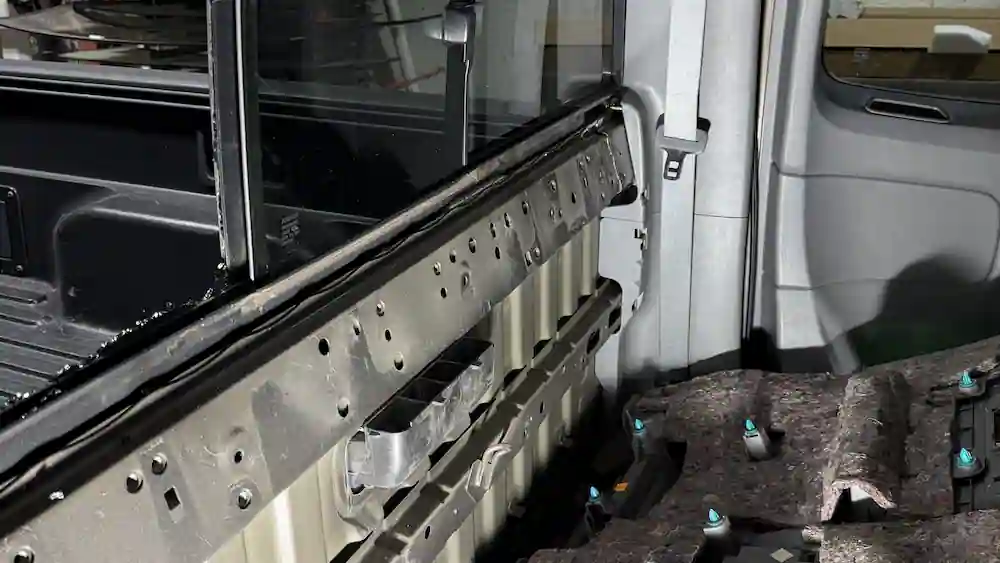 Rear glass prep and adhesive application at 123 Glass Company in Omaha