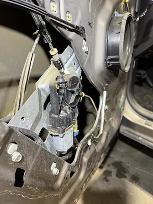Close up of power window motor prior to window regulator replacement at 123 Glass Company in Omaha