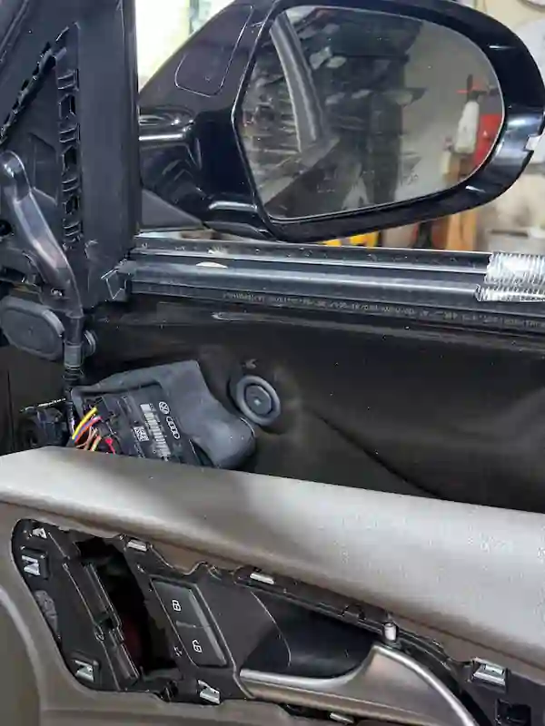 Customer-supplied Audi side view mirror installed and complete at 123 Glass Company in Omaha